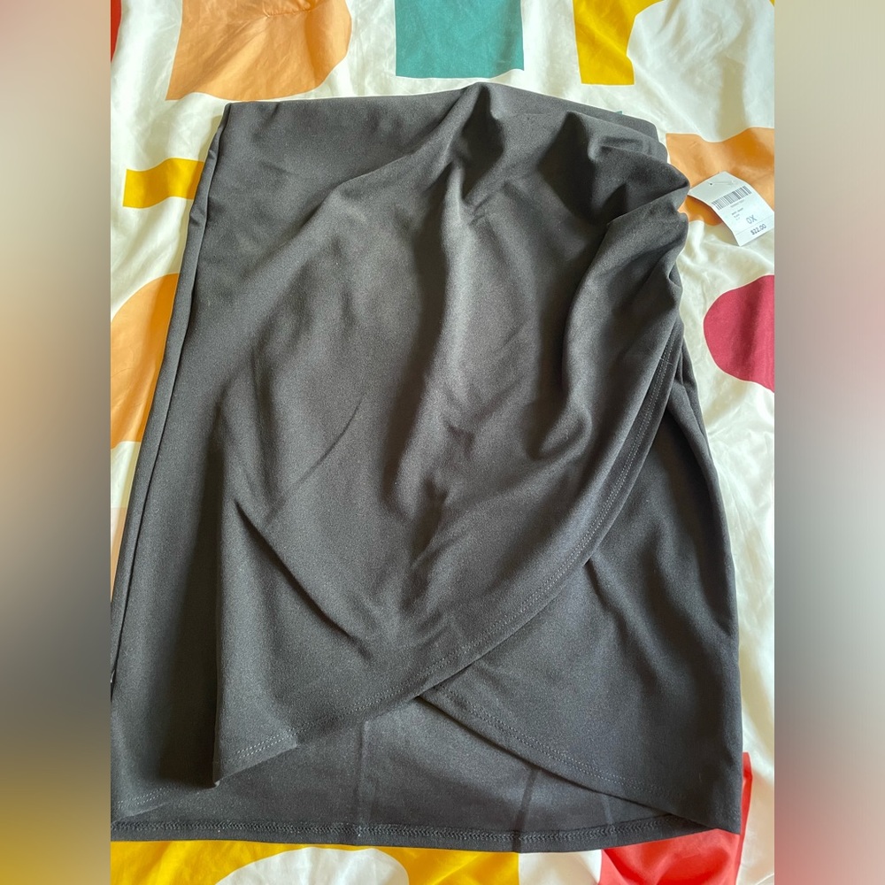 Mini skirt and with ruched side
